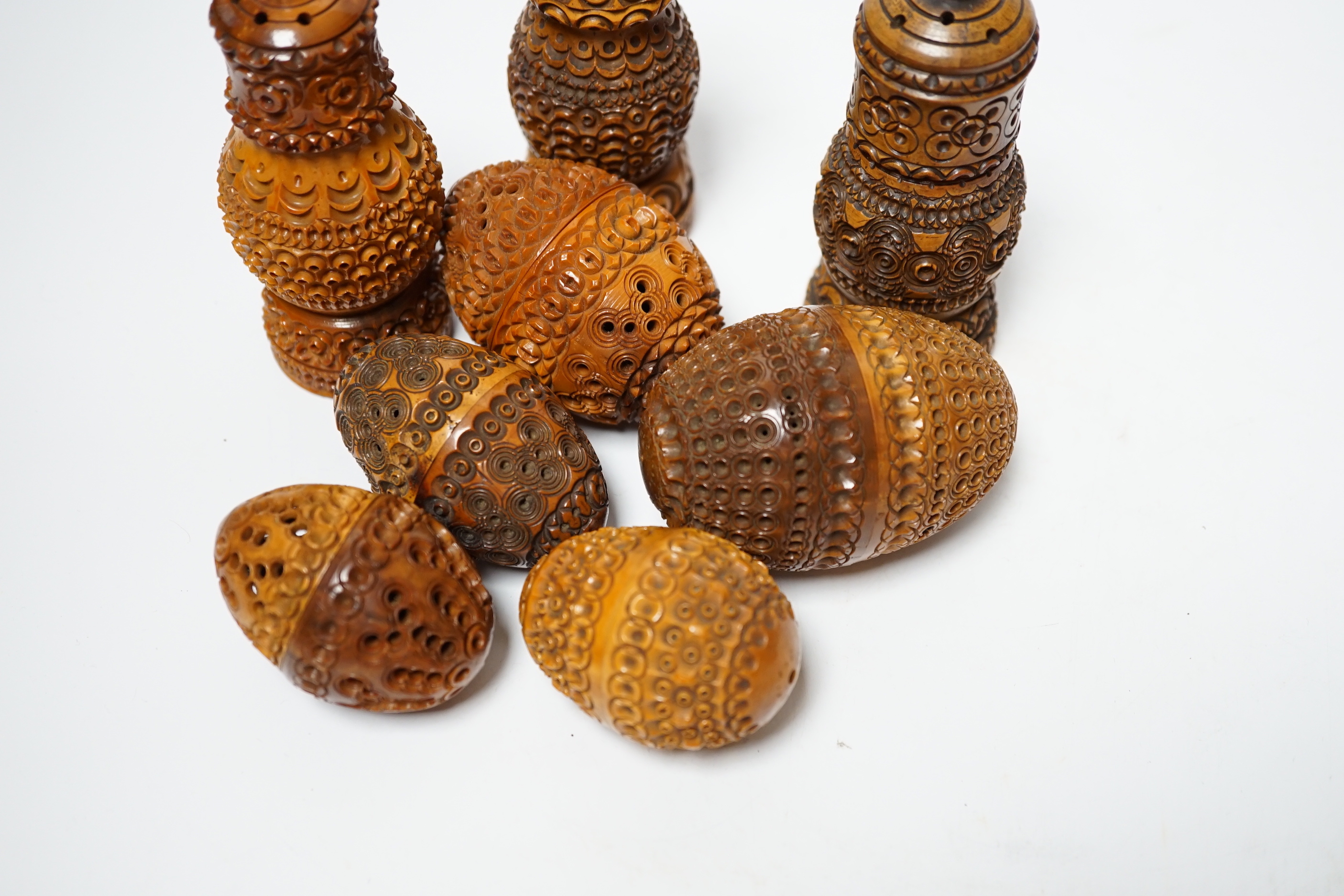 A quantity of coquilla nut carvings (8)